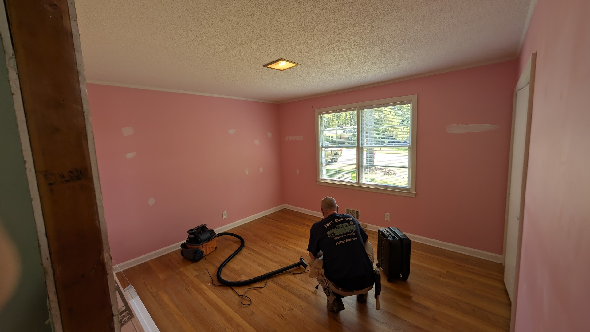 Craftsperson working in a room during an interior refresh