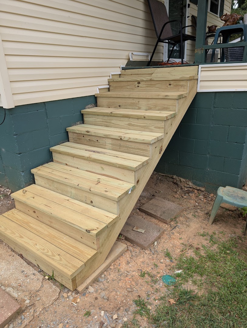 Completed pressure-treated wooden exterior stairs