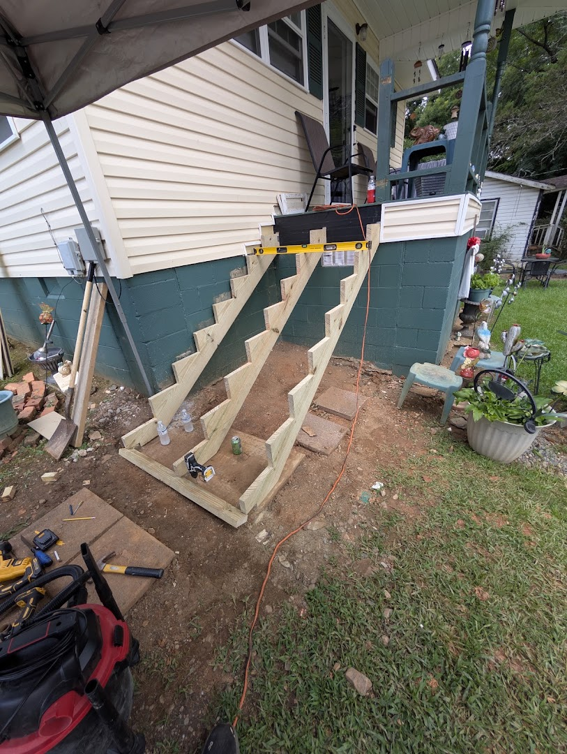 Pressure-treated exterior stair stringers during construction